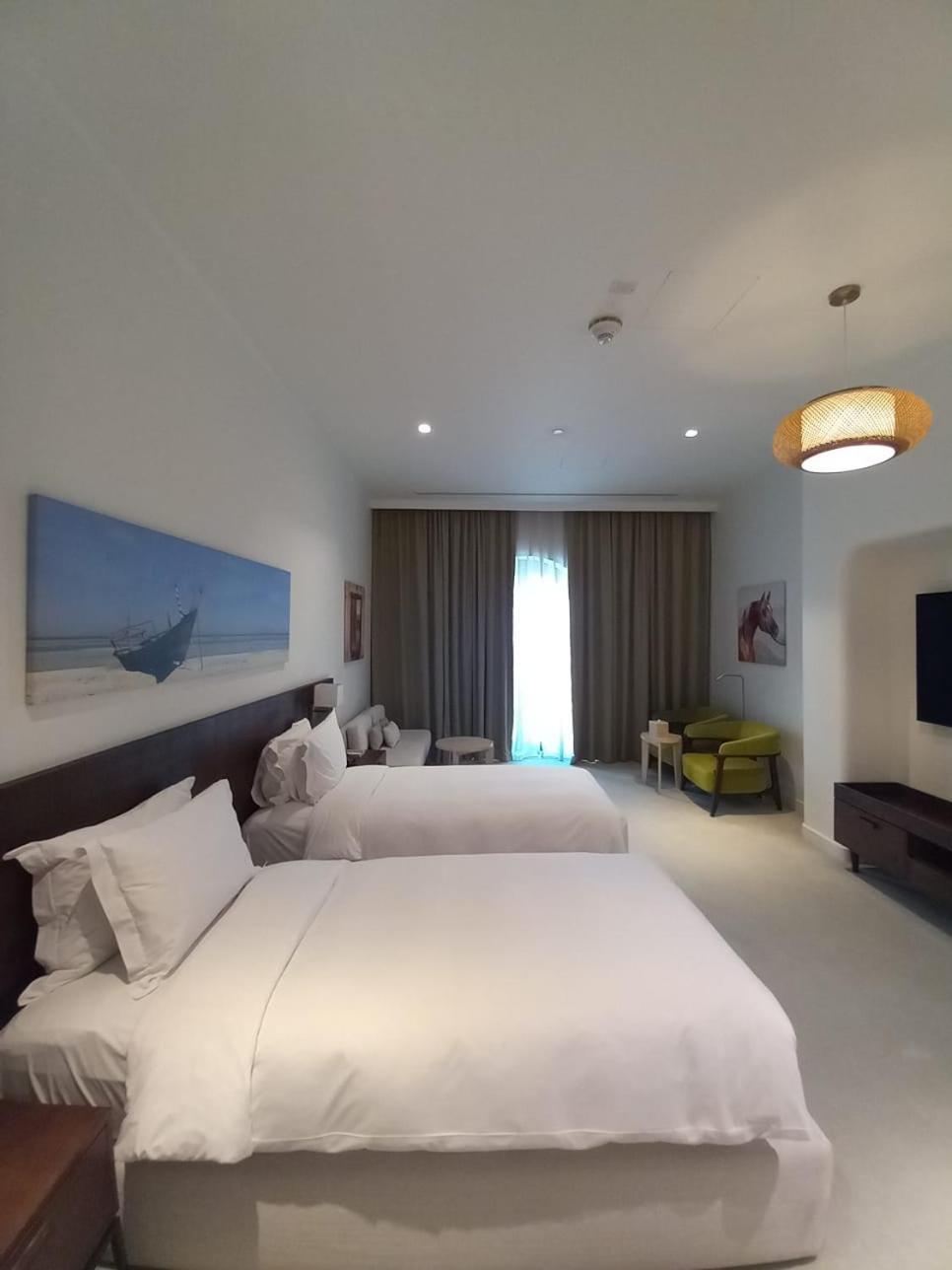 Mina Hotel And Residences By The Torch Ad Dawhah Esterno foto A room at the hotel