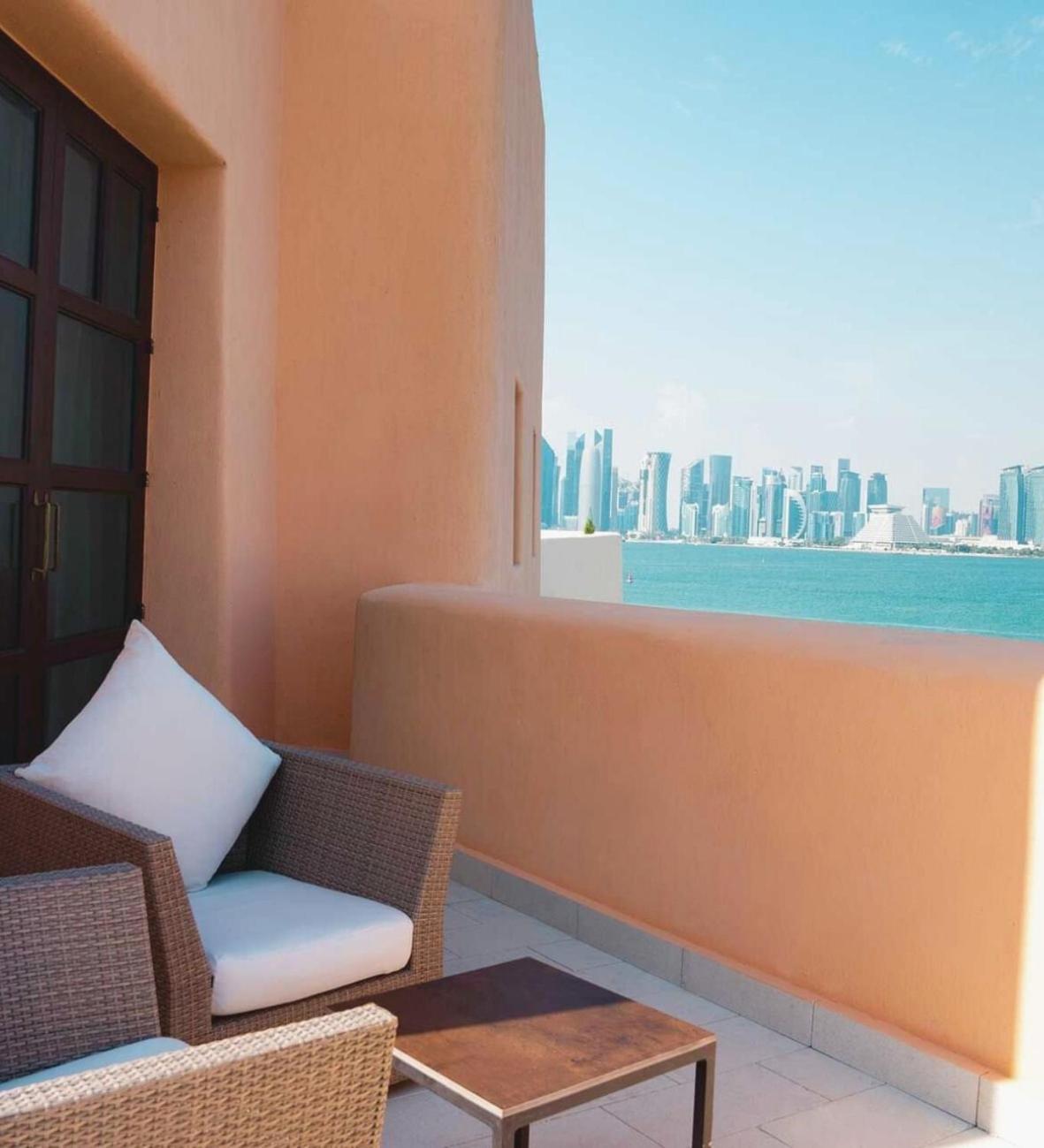 Mina Hotel And Residences By The Torch Ad Dawhah Esterno foto View of the Doha skyline from the hotel