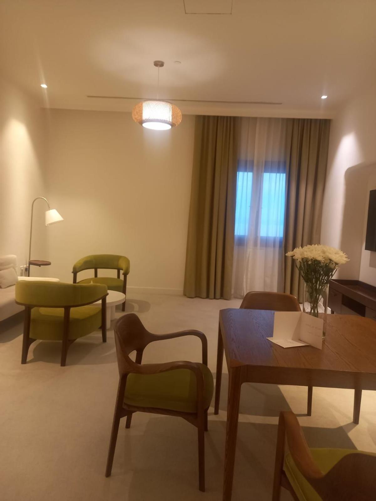 Mina Hotel And Residences By The Torch Ad Dawhah Esterno foto A room at the hotel